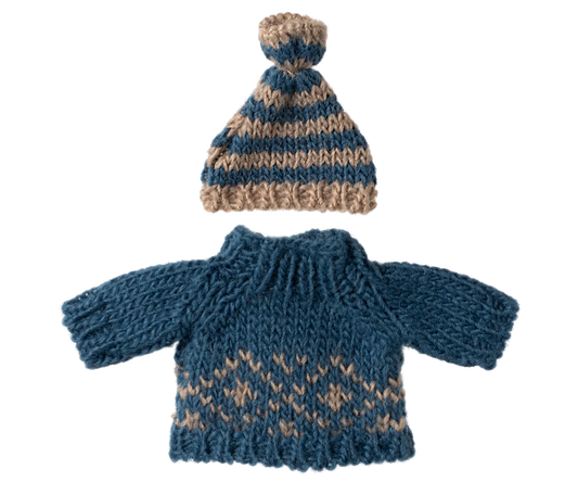 Knitted blue and brown sweater with matching hat on a white background