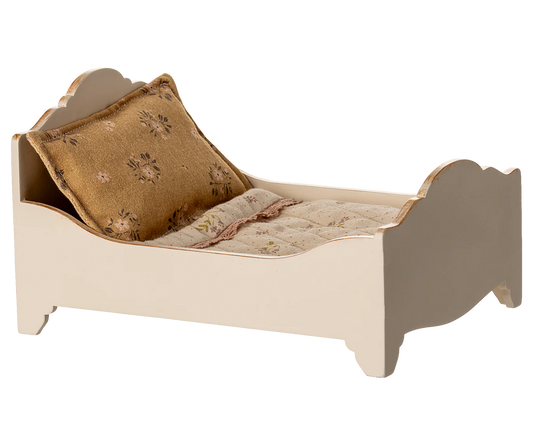 Small bed with a pillow and blanket on a white background | Maileg UK