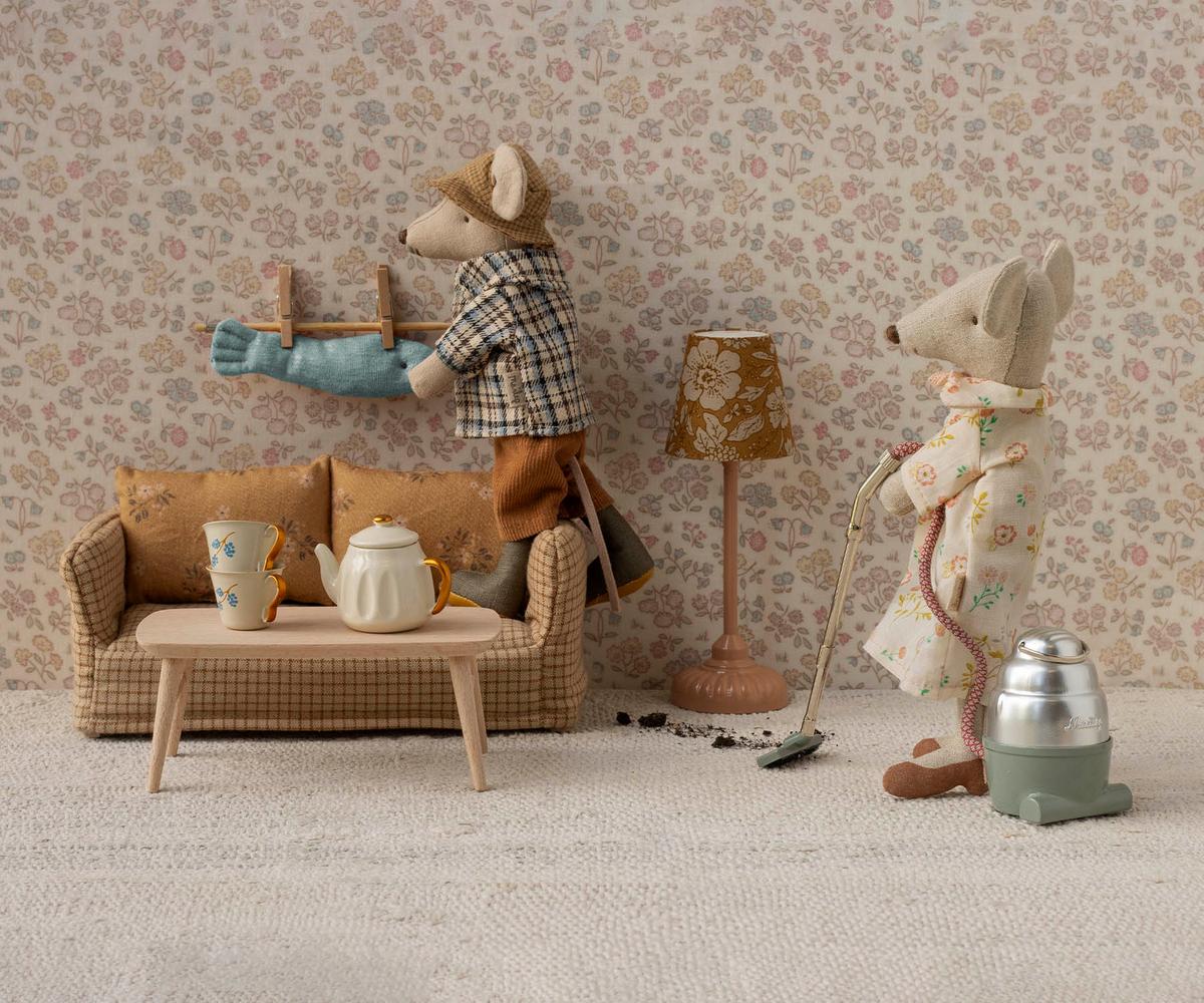 Two toy mice in a room with furniture and decor, including a lamp and a teapot. | Maileg UK