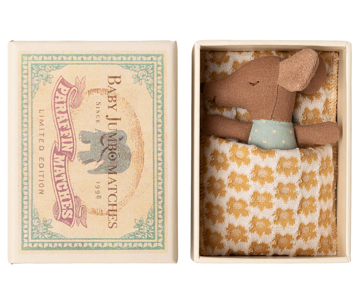 Small stuffed mouse toy in a decorative matchbox packaging with a vintage design.