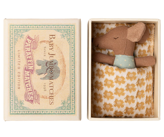 Small stuffed mouse toy in a decorative matchbox packaging with a vintage design.