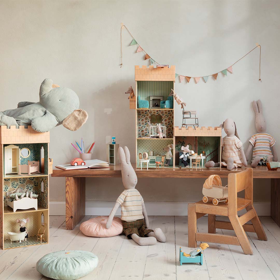 Play room with Maileg Castle set up with dollhouse furniture and Maileg mice and teddies.