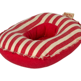 Red and beige striped pet bed with a brand tag on a white background | Maileg UK