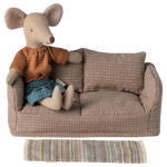 Stuffed mouse toy in a plaid sofa with a striped blanket on a white background | Maileg uk