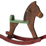 Wooden rocking horse with a green seat on a white background | Maileg UK