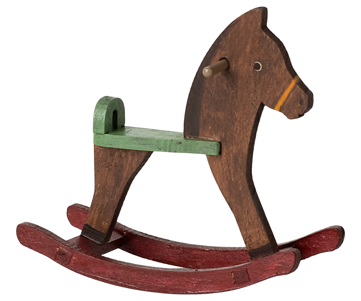 Wooden rocking horse with a green seat on a white background | Maileg UK