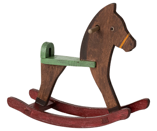 Wooden rocking horse with a green seat on a white background | Maileg UK
