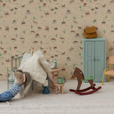 Children's room with toys and furniture against a patterned wall. | Maileg UK