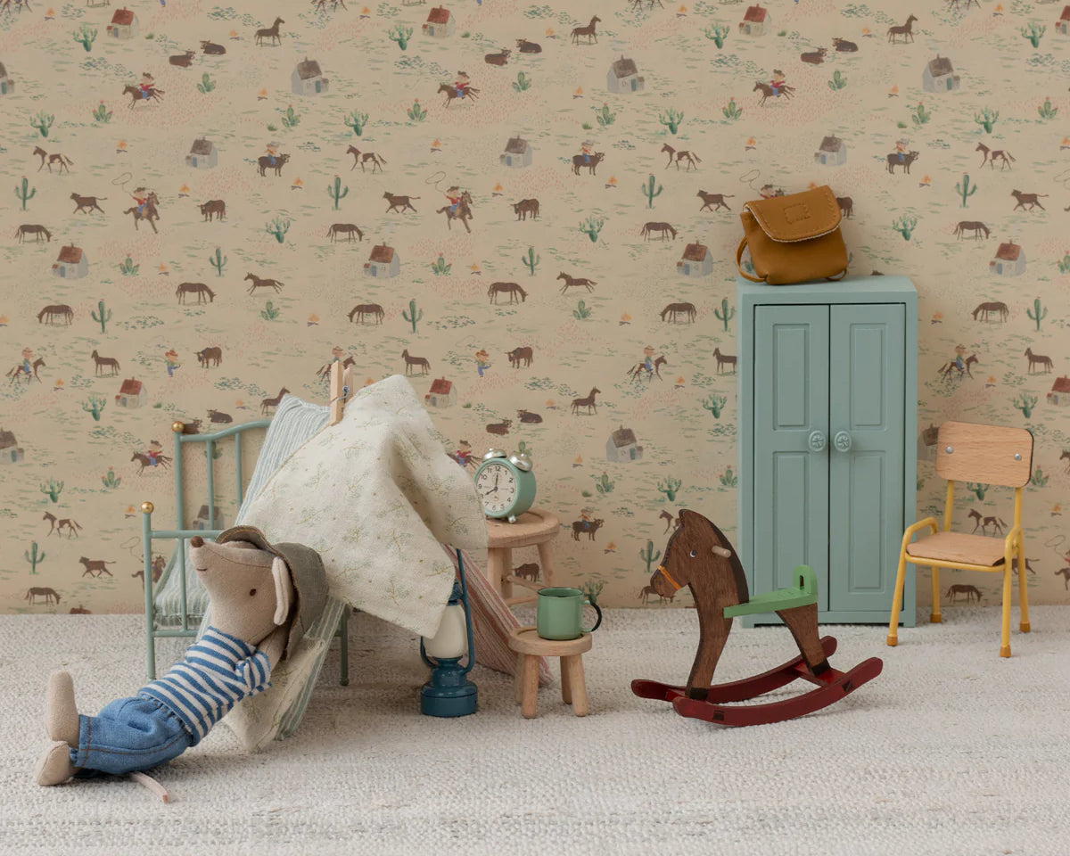 Children's room with toys and furniture against a patterned wall. | Maileg UK