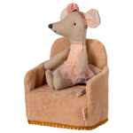 Stuffed mouse toy in a chair with a pink dress and headband on a white background | Maileg UK
