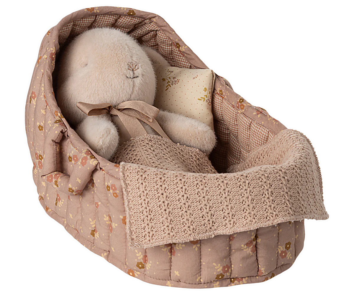 Textile baby booties in a decorative basket with floral pattern on a white background | Maileg UK