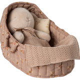 Textile baby booties in a decorative basket with floral pattern on a white background | Maileg UK