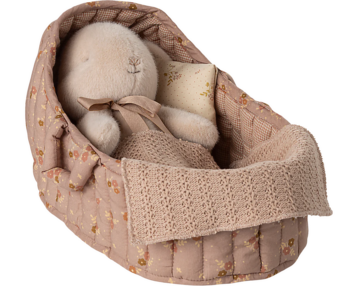 Textile baby booties in a decorative basket with floral pattern on a white background | Maileg UK