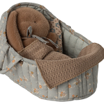 Baby car seat cover with brown plush toys and blanket on a white background | Maileg UK