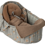 Baby car seat cover with brown plush toys and blanket on a white background | Maileg UK
