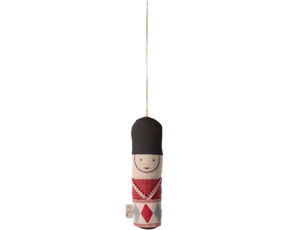 Decorative hanging figure with black hat and red diamond pattern on a white background | mAILEG uk