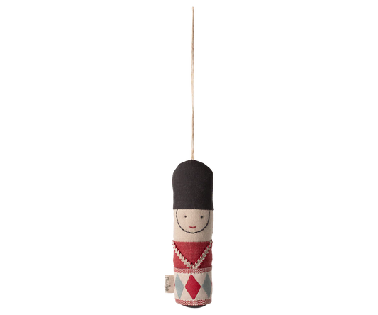 Decorative hanging figure with black hat and red diamond pattern on a white background | mAILEG uk