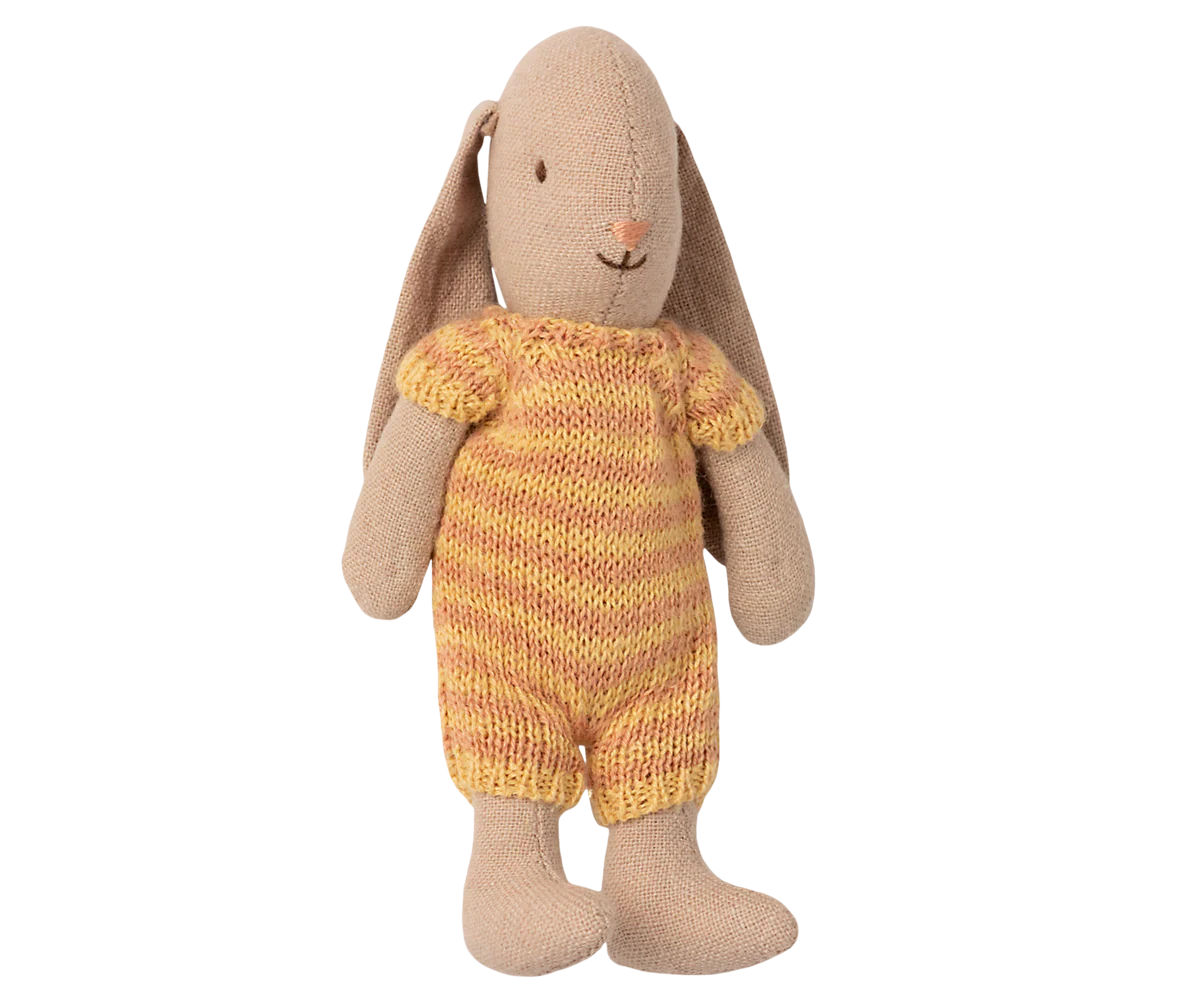 Knitted toy rabbit in a yellow outfit on a white background | Maileg UK