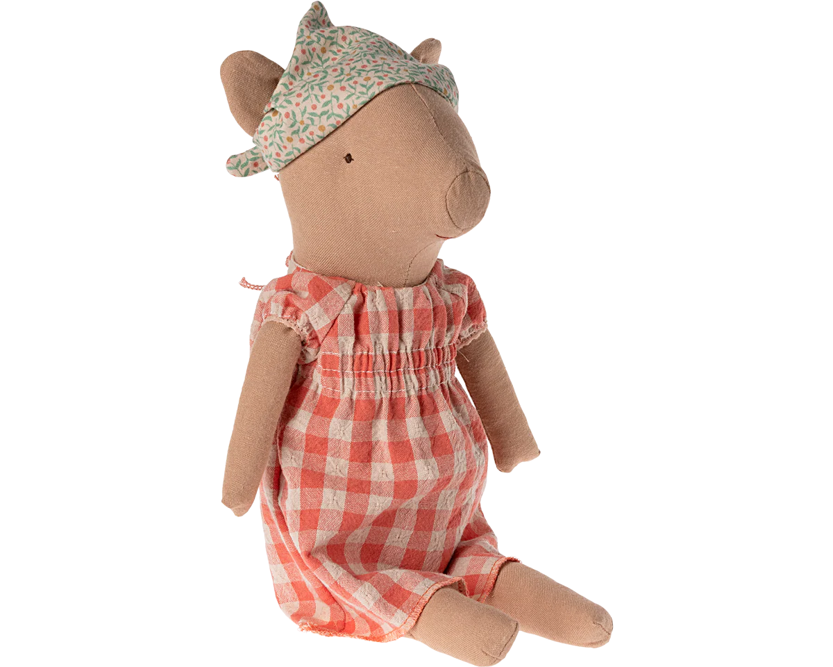 Stuffed animal toy dressed in a red checkered dress and floral hat on a white background | Maileg UK