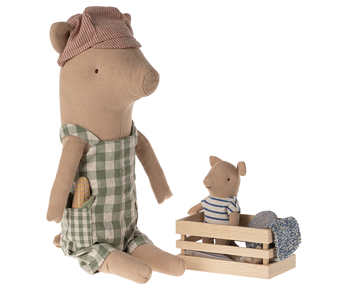 Stuffed animal in a checkered outfit with a smaller animal in a crate on a white background | Maileg UK