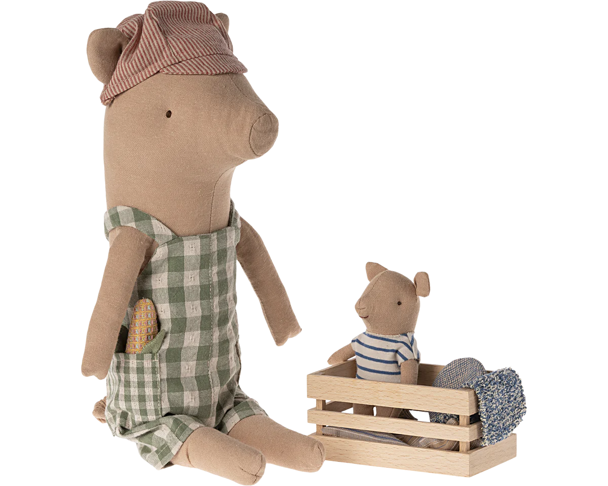Stuffed animal in a checkered outfit with a smaller animal in a crate on a white background | Maileg UK