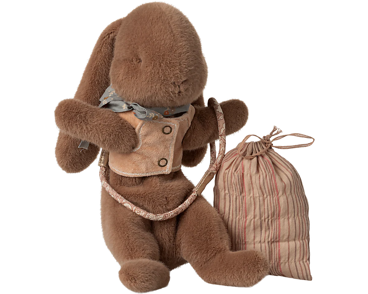 Brown plush bunny with a backpack and striped bag on a white background |Sleeping bunny supply, Harness | Maileg UK