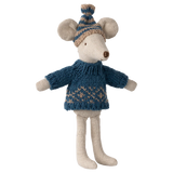 Stuffed mouse toy wearing a blue sweater and knitted hat on a white background