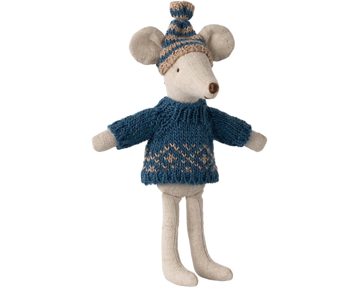 Stuffed mouse toy wearing a blue sweater and knitted hat on a white background