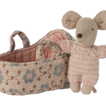 Knitted mouse toy with floral-patterned basket on a white background