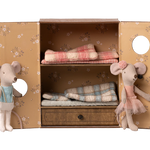 Two toy mice in a decorative box with folded fabric and a drawer. | mAILEG uk