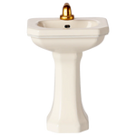 White pedestal sink with a gold faucet on a white background | Maileg uk