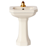 White pedestal sink with a gold faucet on a white background | Maileg uk