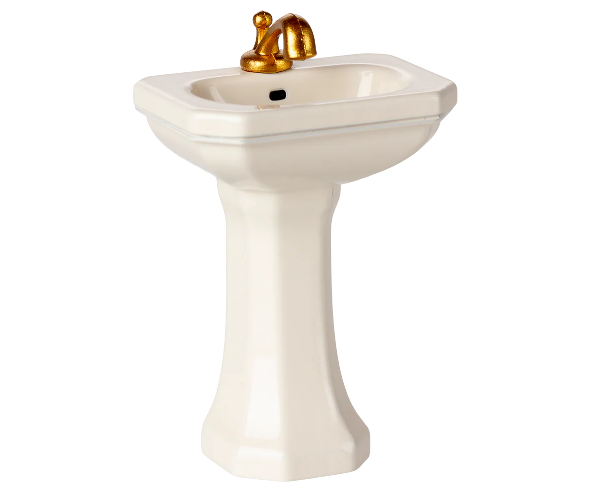 Pedestal sink with gold faucet on a white background | Maileg UK