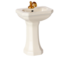 Pedestal sink with gold faucet on a white background | Maileg UK