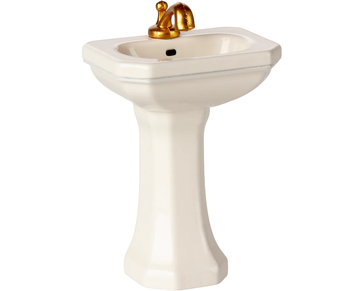 Pedestal sink with gold faucet on a white background | Maileg UK