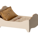 Small bed with a pillow and blanket on a white background | Maileg UK