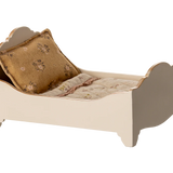 Small bed with a pillow and blanket on a white background | Maileg UK