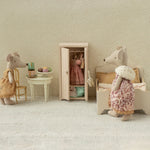 Miniature scene with toy mice in a room setting, including a wardrobe and furniture. | Maileg UK