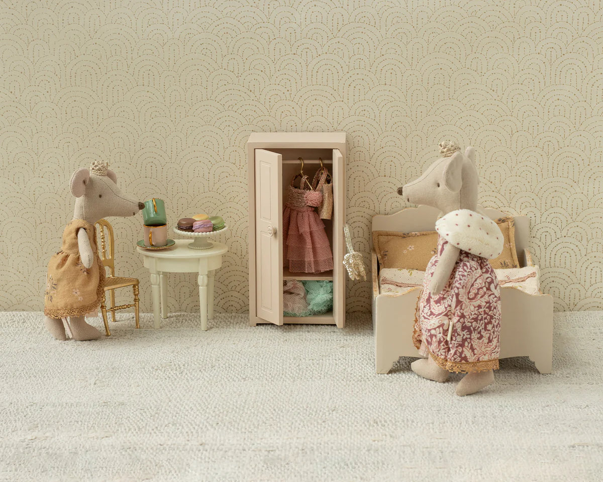 Miniature scene with toy mice in a room setting, including a wardrobe and furniture. | Maileg UK