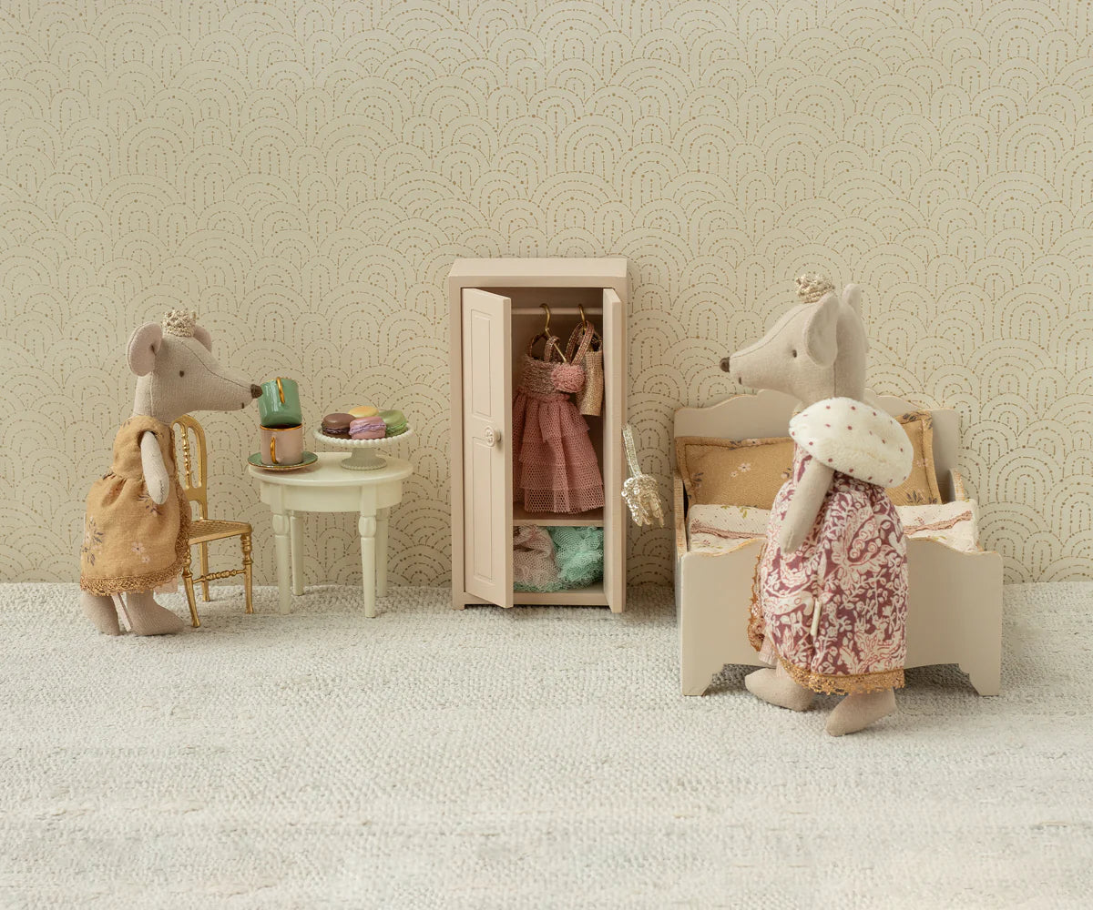 Miniature scene with toy mice in a room setting, including a wardrobe and furniture. | Maileg UK