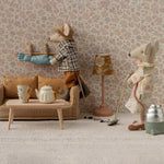 Two toy mice in a room with furniture and decor, including a lamp and a teapot. | Maileg UK