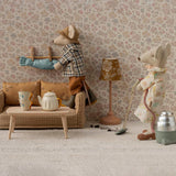 Two toy mice in a room with furniture and decor, including a lamp and a teapot. | Maileg UK