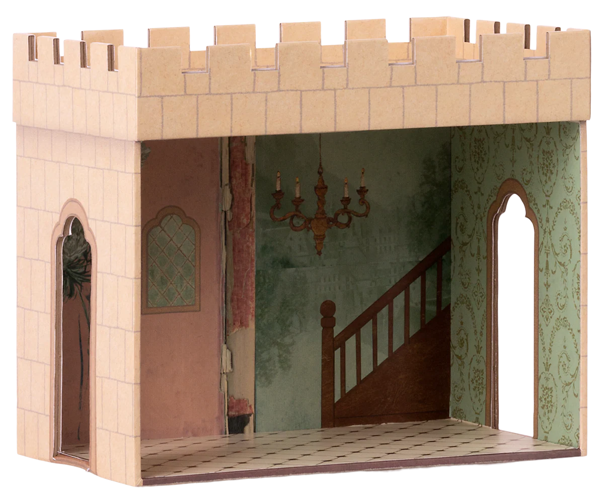 Wooden dollhouse with castle design featuring a staircase and chandelier. | Maileg UK