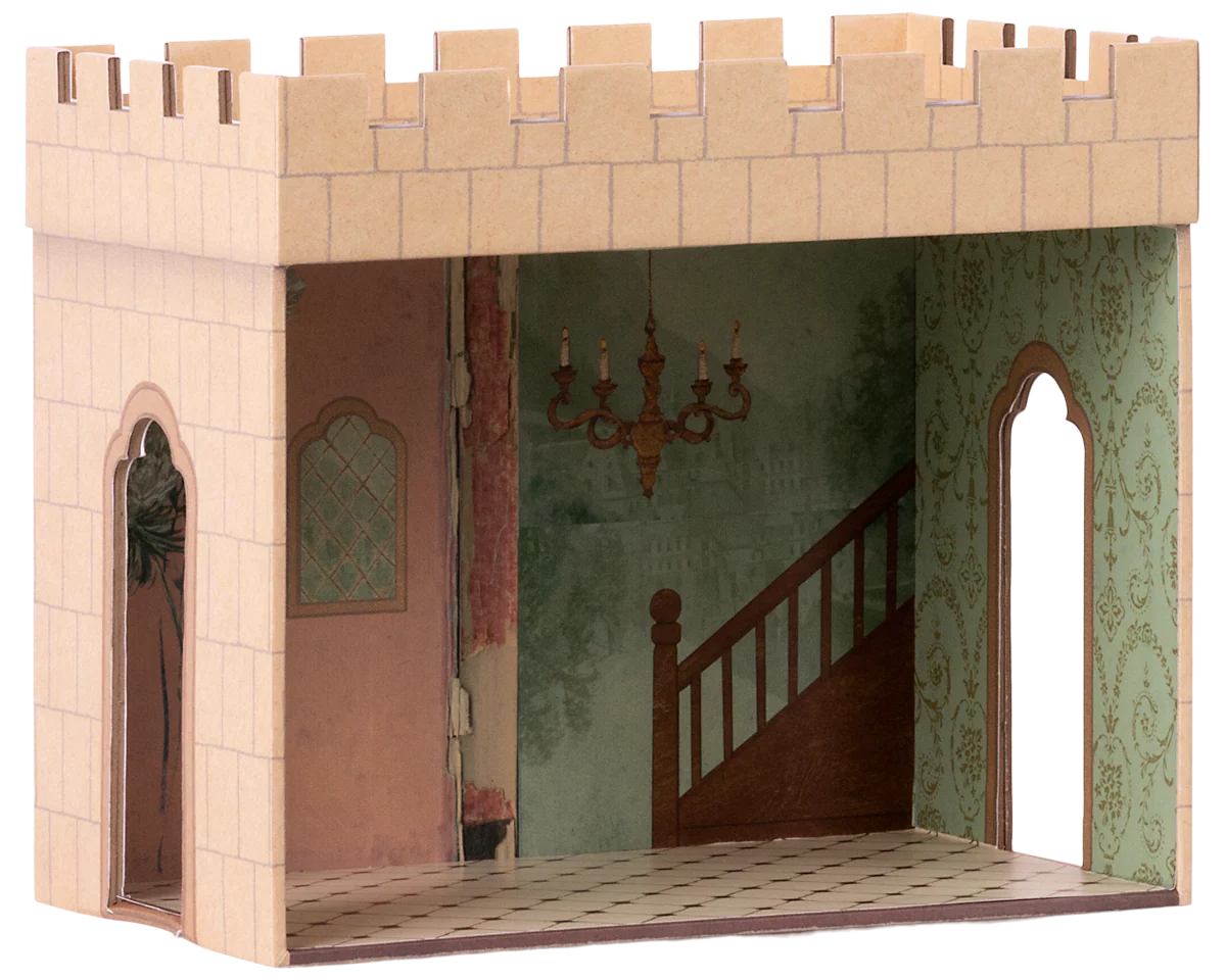Wooden dollhouse with castle design featuring a staircase and chandelier. | Maileg UK