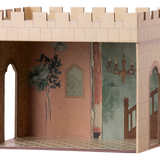 Wooden dollhouse with decorative interior walls and a chandelier. | Maileg UK