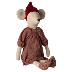 Stuffed mouse toy wearing a red dress and hat on a white background