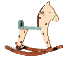 Wooden rocking horse with a white face, brown spots, and a green mane on a white background. | Maileg UK