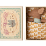 Small stuffed mouse toy in a decorative matchbox packaging with a vintage design.