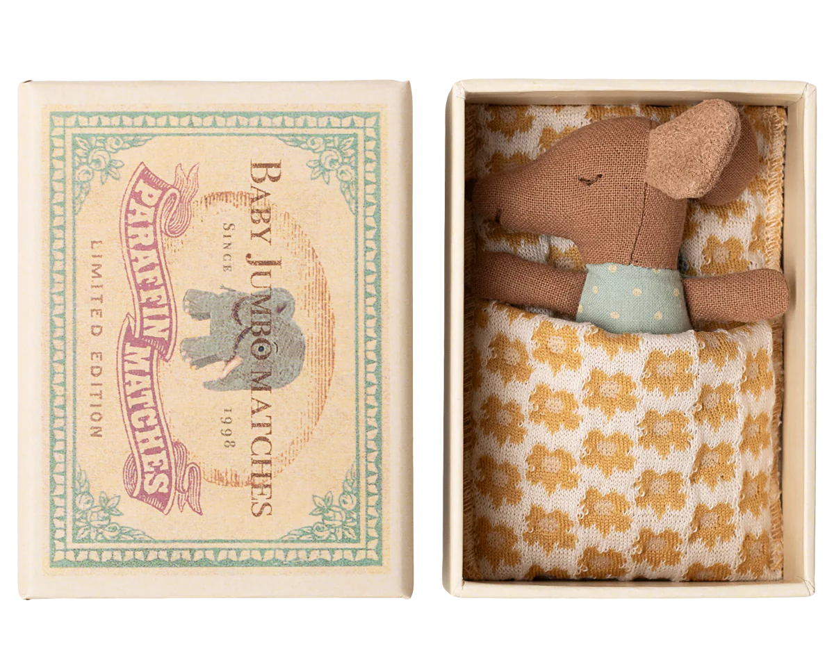 Small stuffed mouse toy in a decorative matchbox packaging with a vintage design.