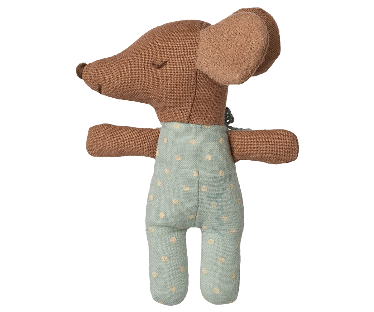 Stuffed toy mouse in a green outfit with gold polka dots on a white background